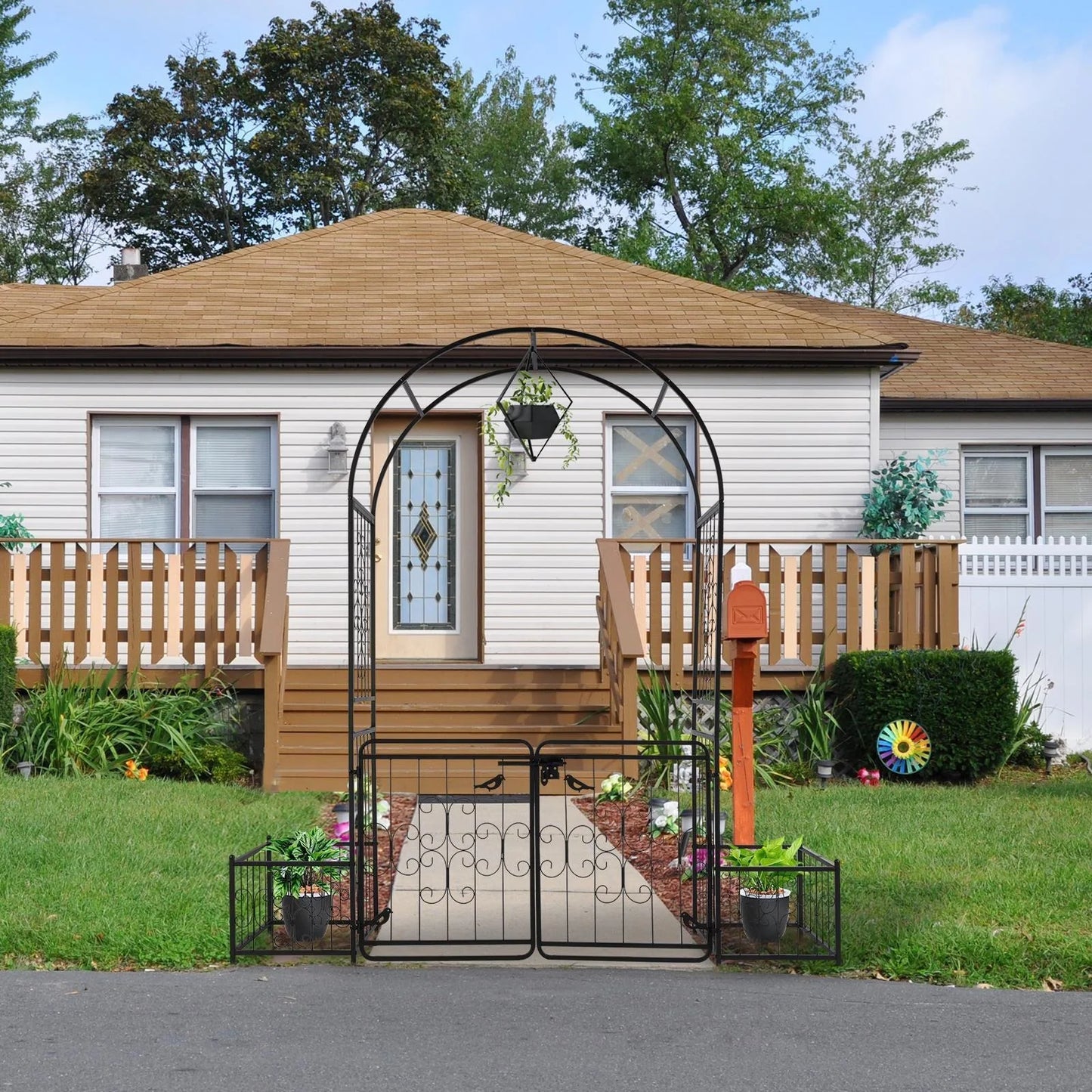 Metal Garden Arch with Planter Boxes and Gate.